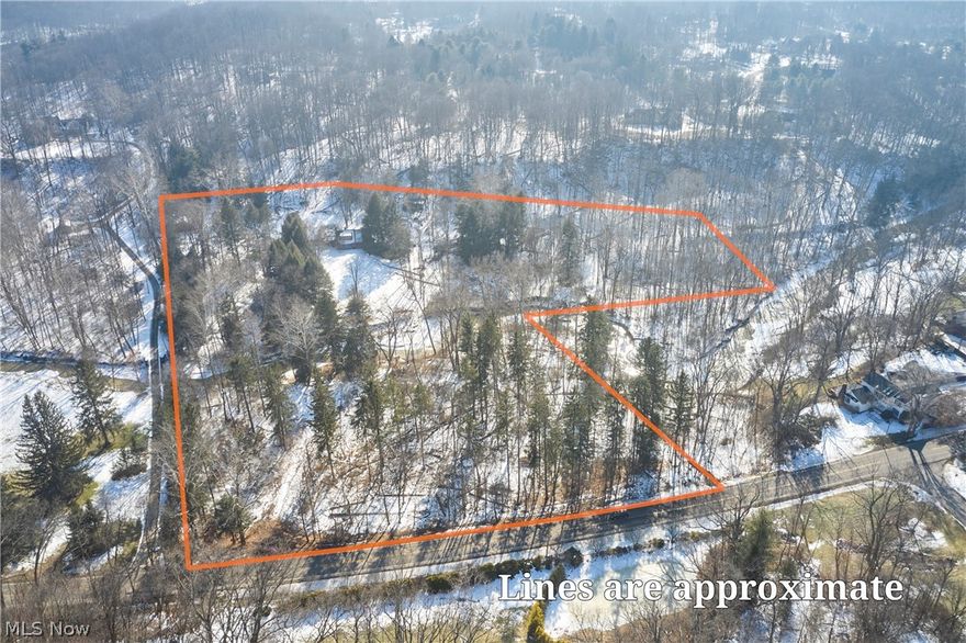 Rare opportunity to secure 9.8 wooded acres with a scenic river running through the property, offering privacy, nature, and exceptional potential. An existing home sits on the property, providing the option to renovate, restore, or reimagine the current structure, or design and build a custom residence from the ground up.
Access to the property presents the opportunity to design and construct a signature bridge entrance, a distinctive feature often incorporated into luxury builds to create privacy, architectural impact, and long-term value. This element allows a future owner to thoughtfully design a dramatic and memorable approach to the estate.
Whether transforming the existing home or building new, this property offers architectural freedom, seclusion, and flexibility rarely available in today’s market.
Strategically positioned for value and priced for immediate opportunity, this is a rare chance to secure nearly 10 acres below market with multiple pathways for future potential. Located in the award winning Revere school district, quick access to I-77, close to shopping centers and the Cuyahoga Valley National Park. 
Subject to lender approval.