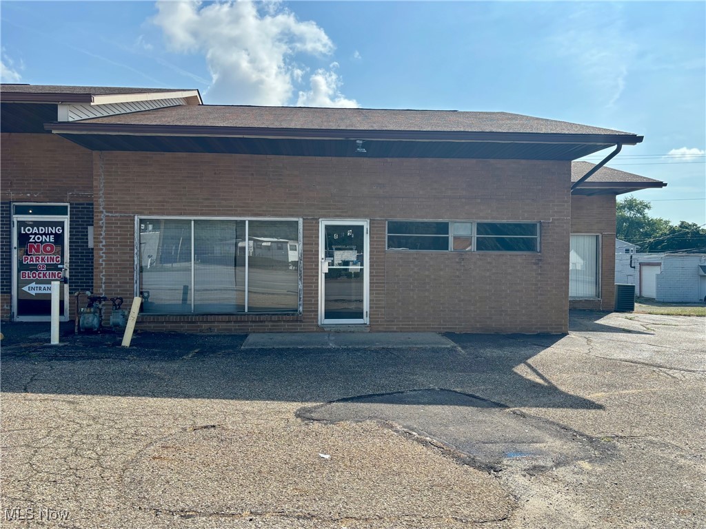 Professional & Versatile Commercial Space for Lease – 1,350 Sq Ft + 765 Sq Ft Storage & Garage. Discover a flexible commercial suite ideal for a variety of business uses which may include general office, medical, financial, retail, personal services, sales office, showroom, and more. The main level offers approximately 1,350 square feet, currently divided into five individual rooms plus a private restroom, allowing for easy configuration to suit your needs. The private lower level adds 765 square feet of storage space, a second private restroom, and a one-car garage—perfect for secure parking or additional utility space. The building was recently purchased, and several exterior improvement projects are scheduled over the next year, including a new garage door for this unit, enhancing both functionality and curb appeal. This property is located on a high-traffic corridor with 13,210 vehicles per day (AMATS 2025), offering excellent exposure for your business. It provides convenient access to I-76 and I-77, and is just minutes from local dining, retail, and service amenities. Ample on-site parking is available. This is an excellent opportunity for both start-ups and established businesses in search of the perfect new space. With strong visibility, a versatile layout, and convenient access, this property is ready to support your next chapter. Tenant will be responsible for gas & electric, must sign a 12 month lease, and will be subject to a credit/background check. Schedule your private showing today.