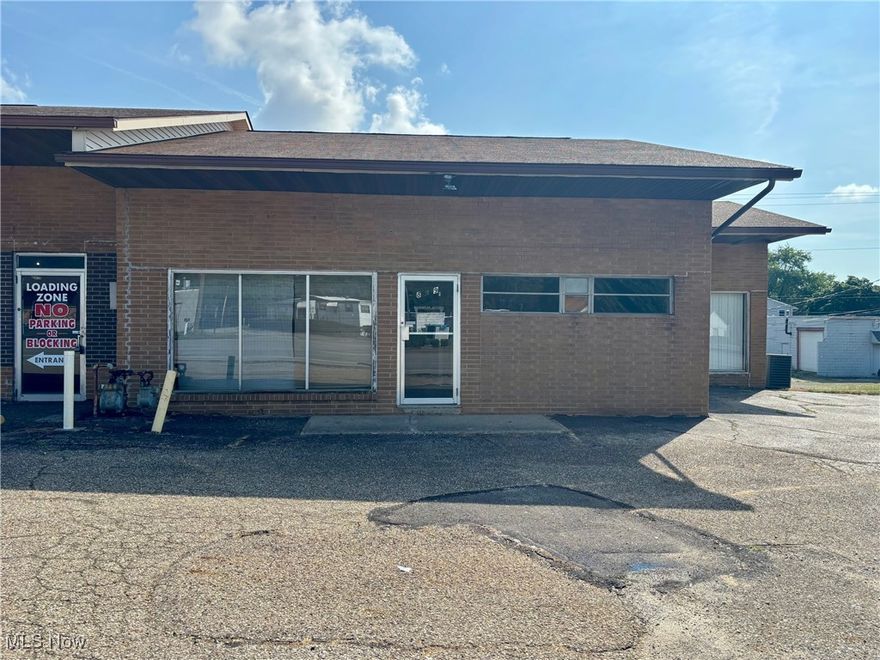 Professional & Versatile Commercial Space for Lease – 1,350 Sq Ft + 765 Sq Ft Storage & Garage.  Discover a flexible commercial suite ideal for a variety of business uses which may include general office, medical, financial, retail, personal services, sales office, showroom, and more. The main level offers approximately 1,350 square feet, currently divided into five individual rooms plus a private restroom, allowing for easy configuration to suit your needs. The private lower level adds 765 square feet of storage space, a second private restroom, and a one-car garage—perfect for secure parking or additional utility space. The building was recently purchased, and several exterior improvement projects are scheduled over the next year, including a new garage door for this unit, enhancing both functionality and curb appeal. This property is located on a high-traffic corridor with 13,210 vehicles per day (AMATS 2025), offering excellent exposure for your business. It provides convenient access to I-76 and I-77, and is just minutes from local dining, retail, and service amenities. Ample on-site parking is available. This is an excellent opportunity for both start-ups and established businesses in search of the perfect new space. With strong visibility, a versatile layout, and convenient access, this property is ready to support your next chapter. Tenant will be responsible for gas & electric, must sign a 12 month lease, and will be subject to a credit/background check. Schedule your private showing today.