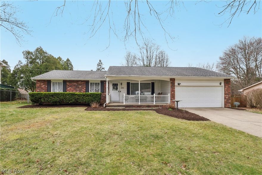 Welcome to 2992 Greenridge Drive in Norton. This well-maintained 3-bedroom, 1.5-bath ranch offers 1,424 square feet of comfortable living space on a nicely sized 0.29-acre lot. Recent updates provide peace of mind, including new flooring (2022–2025), a beautifully updated main bath (2025), and a refreshed kitchen featuring a breakfast bar, new countertops, backsplash, and appliances (2024). The home offers both formal living and dining rooms, along with a cozy family room with a fireplace and sliding doors that open to a deck overlooking the fenced backyard with a shed, perfect for outdoor enjoyment. Additional highlights include an inviting covered front porch. The full basement features a finished laundry area (2025), glass block windows.  A 2-car garage with extra storage completes this move-in ready home. Home comes with a one year home warranty.