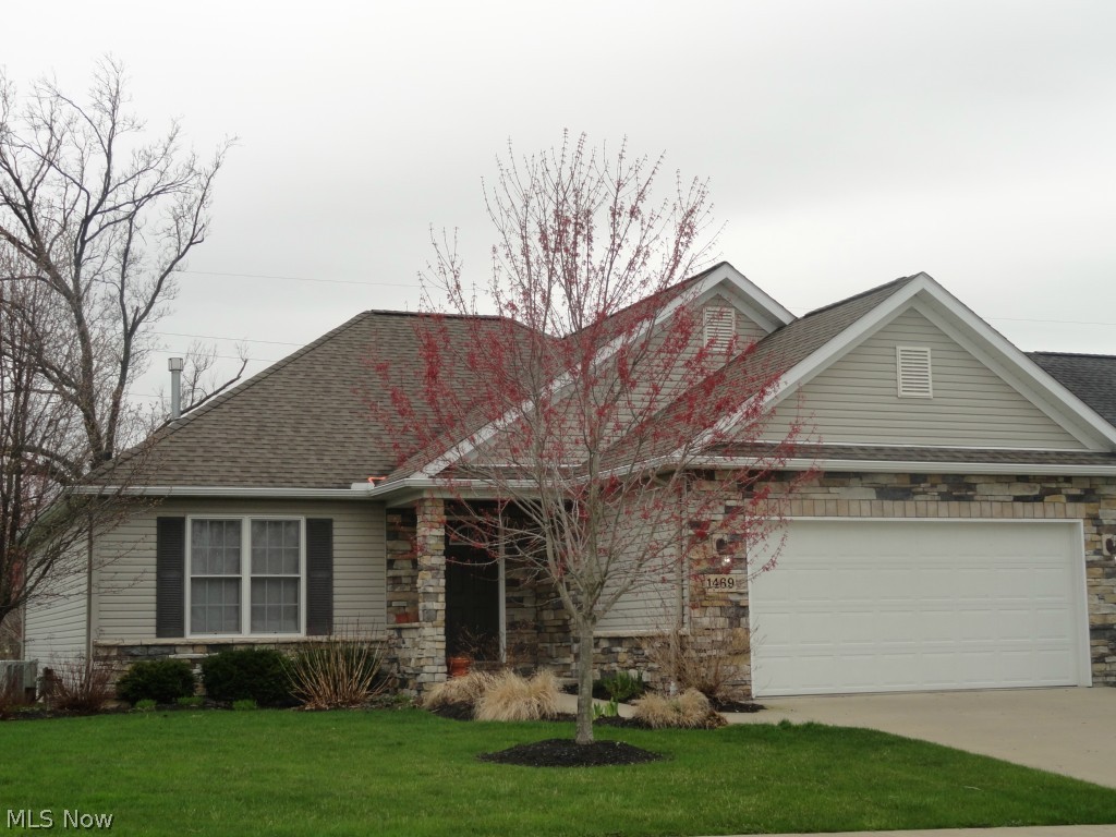 Cluster home in a desirable quiet location ready for a new owner! Nice ranch featuring a great room with beautiful fireplace and newer hardwood floors (2014). Fully applianced kitchen with walk in pantry. Door in dining area leads to a covered deck and spacious yard. Master bedroom has cathedral ceiling, private bath with stand up shower and walk in closet. Open staircase to lower level has a partially finished family room and plenty of storage. Quick possession possible - come take a look!!!