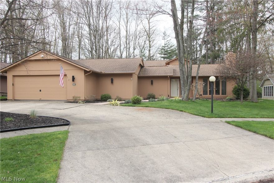 Sleek, sophisticated and modern describe this stunning home located in desirable Meadowood on a quiet cul--de-sac lot. Super updated with awesome finishes throughout. Lots of living space with family room, office, living room, eat in kitchen and formal dining room. Lots of bamboo flooring, granite and much more. 2 bedrooms down with a full bath and upstairs master and master bath. Master has a 2nd story balcony overlooking the central courtyard with newer stamped concrete. Super private treed lot with all the amenities of Meadwood, Olympic size pool, playground & tennis! Newer HVAC and much more!