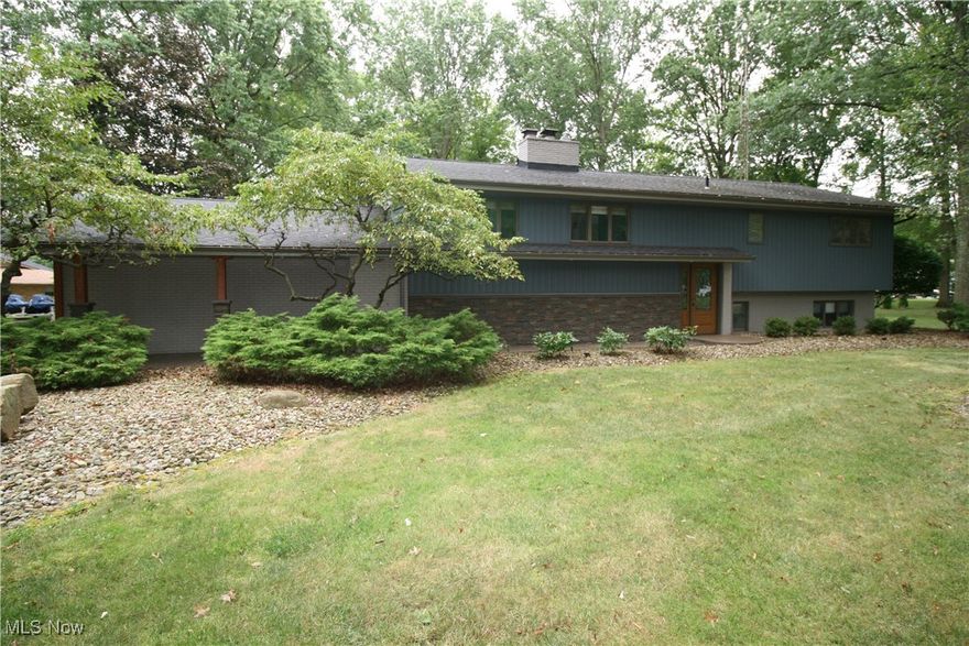 Look at this very updated ranch style home! 2936 square ft fully remodeled inside and out. This home is situated on a 1.2 acre lot near Lakeview schools, minutes from Mosquito Lake and the surrounding parks. 2 car garage attached to home and 2 car detached garage with furnace & AC in additional living space. Huge driveway with parking for camper/boat/outdoor recreation vehicles. Large yard with mature trees - outside living offers a Trex upper deck(2020), stamped concrete lower patio with under decking,  Trex Rainescape, ceiling fan, and mounted TV from the walk out basement. This lovely home has 5 bedrooms with plenty of closets, 3 full baths, 2 gas log fireplaces in upper and lower living areas. Appliances stay! Kitchen on main level has Kraftmaid soft close cabinets with granite counter tops (2016). Lower area has an additional kitchen/bar. Tons storage areas throughout. Finished laundry room. So many other updates - please contact your Realtor for a full list. Don't miss out on this gem!