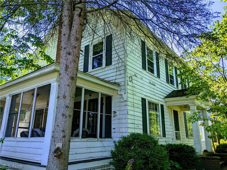 Great opportunity to live in this lovely century home and use the above garage 1 bedroom apartment for income or an in law suite.  The home features 3 spacious bedrooms on the 2nd floor and another extremely cool 4th bedroom on the 3rd floor.  There is also a large full bath on the 2nd floor and a very large half bath on the main floor.  Enjoy the beautifull woodwork throughout and hardwood floors.  Summer nights can be spent on the screened side porch.  The apartment above the garage is quaint with 1 bedroom, 1 bath, living room and kitchen.  The furnace is 3 years old and is ready to add central air.  The upstairs windows were replaced by Window World 3 years ago.  This is also a nice income property.