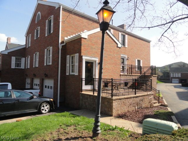 Charming condo on the River convenient to activities, restaurants and festivals at the Front St mall. 2 BR/1 BA plus a third finished room and 1/2 bath in the basement. Nice brick patio. Attached garage with newer garage door. New furnace, AC and water heater in 09'. new roof, balconies and stone patio too! Average gas bill $30! Average utility bill $70--Cheaper than rent.