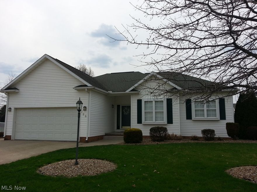 This home is a Knockout! Located in Williams Village. Spacious kitchen with beautiful Schrock cabinets, stainless appliances, large living room and dining room with new flooring, gas fireplace, cathedral ceilings, first floor laundry and laundry in basement as well. Huge great room finished in basement with possible 4th bedroom in lower level. Large yard with privacy fence and storage barn. Immaculate home minutes from the highway, shopping and schools.