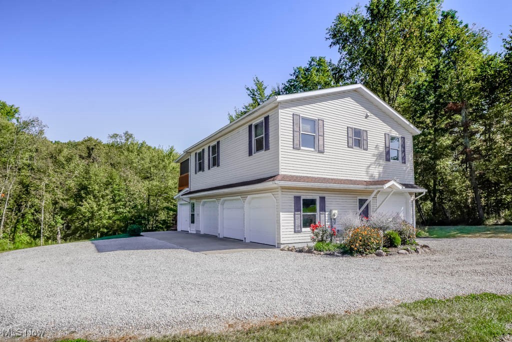 Enjoy country living on 2.5 scenic acres with garage space for four cars and plenty of room to spread out! Set back from the road on a long gravel drive, this home offers privacy and peaceful surroundings.
Step inside to a vaulted living room that flows into the fully applianced eat-in kitchen featuring granite countertops, oak cabinetry with pull-out drawers, a skylight, and a handy dumbwaiter to the garage. French doors open to a covered deck with rolling shutters, perfect for relaxing or entertaining. Down the hall, two bedrooms with double closets share a full bath with a tile step-in shower, and the laundry closet with washer and dryer stays for your convenience.
Car enthusiasts will appreciate the garage space, including one bay with a modern full bath and built-in pantry storage. Updates include a brand-new septic system, newer furnace, A/C, and hot water tank. A temperature-controlled attic fan, water softener, iron filter, and updated exterior lighting make this property a great find.
Schedule your showing today to see it in person!