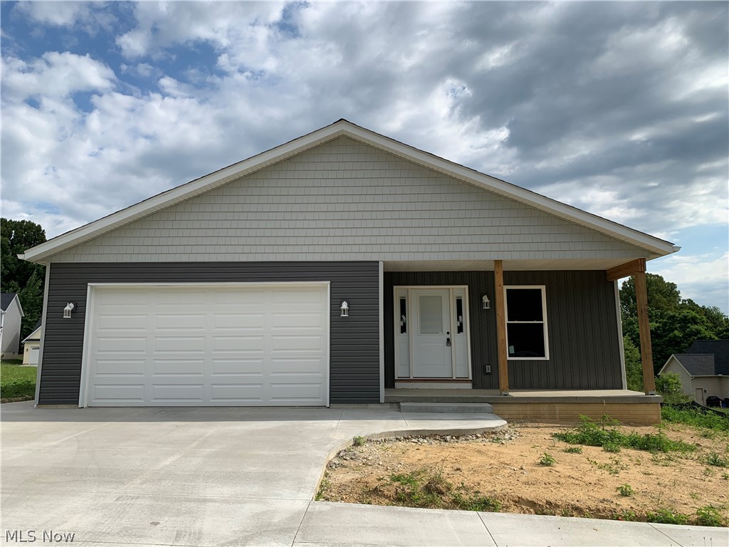 New Construction! This Energy Star rated open concept ranch home has approx. 1384 square feet of living! Living room with vaulted ceilings, a beautiful kitchen with granite countertops and dining area, 3 bedrooms and a full bath complete the living space. Full basement with full bath and laundry. Front porch and rear raised deck provide additional outdoor living space. Finished two car attached garage. Take a few minutes to stop and look at the beautiful quality home that was built by The Four Cities Compact Carpentry Program located at Wadsworth High School. Auction: Tuesday, July 23, 2024. Auction begins at 6:29 P.M.