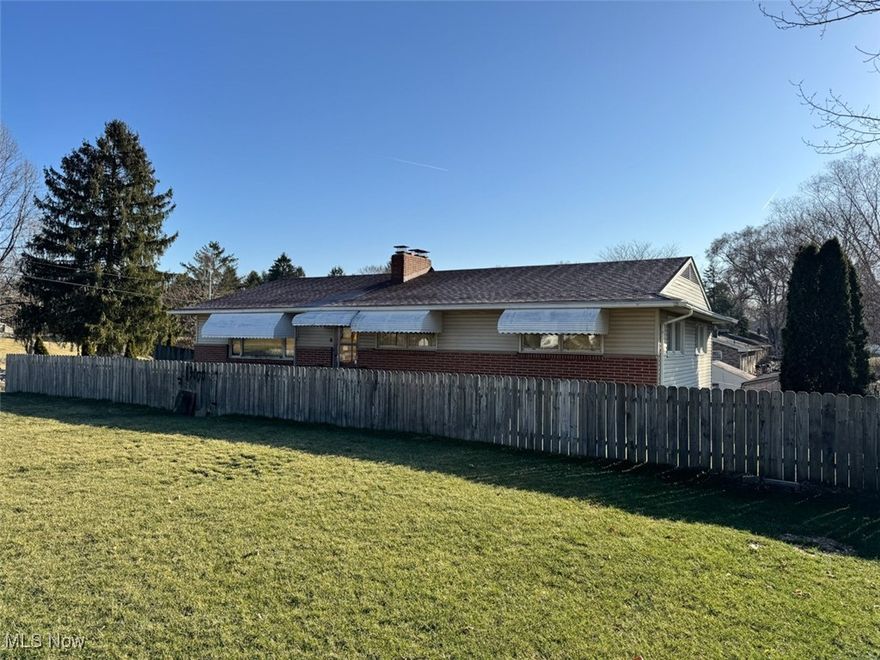 Investment Opportunity. Lake Township Ranch Home, .437-Acre Corner Lot. Lake Local Schools. Live Onsite with Online Bidding Available on Real Estate. After 40 years, the owner is downsizing to an apartment. ABSOLUTE AUCTION, all sells to the highest bidder on location. ONLINE BIDDING BEGINS THURSDAY, APRIL 10, 2025, at 12:00 PM, and AUCTION LIVE ON-SITE BIDDING WILL BEGIN FRIDAY, APRIL 11, 2025, 12:00 PM, REAL ESTATE SELLS FIRST. 1957 ranch home has 1,352 sq. ft. The main level features a front living room with a fireplace, an open dining room and an original kitchen, three bedrooms, a full bath, and a laundry room with a half bath. Partially finished basement with paneled rec room, second fireplace, bedroom or office with picture window, shower bathroom, walk-out to two-car garage. Modern propane forced-air furnace (gas available), new central air unit, updated breaker electric, public water, septic. The front basement wall has been professionally repaired. Blacktop drive, fenced lot, two storage buildings. It's a great location and a chance to put in some sweat equity. The home is shown by appointment and will be open on auction day starting at 10:00 AM.