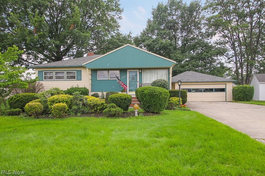 Take a look at this gorgeous, ONE-OWNER rustic ranch home in Parma, Ohio! This suburban oasis features five bedrooms, two full baths and sits on nearly half an acre of land. The close proximity to Snow Road, W. 130th and I-480 means quick and easy access to all the shopping and entertainment, and is within walking distance to the Metroparks trails! The home itself boasts original hardwood floors and a plethora of living space with a family room and private master bedroom/ bathroom addition, convenient 2-car attached garage, and eat in kitchen. As you make your way down into the basement, you will find an enormous, fully-finished recreation room, laundry room, and a bonus room that can be used as a fifth bedroom. Upon exiting the back door, you are met with greenery galore – a magnificent backyard teeming with life simply awaiting your creative touches. The backyard also features a concrete patio, deck, and a relaxing 6-seater hot tub! Recent improvements include: New carpeting in the f