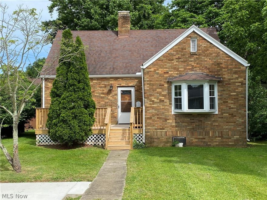 100% Move-in ready all brick, 2 bedroom, 1 bath home. All freshly painted interior in desirable greys & whites! Spacious living room has a beautiful brick fireplace. Ample sized bedrooms and closet space. Plenty of cabinet space in the kitchen. Full basement. Attic space has plenty of storage space and could be finished for additional living space. All measurements are approximate.