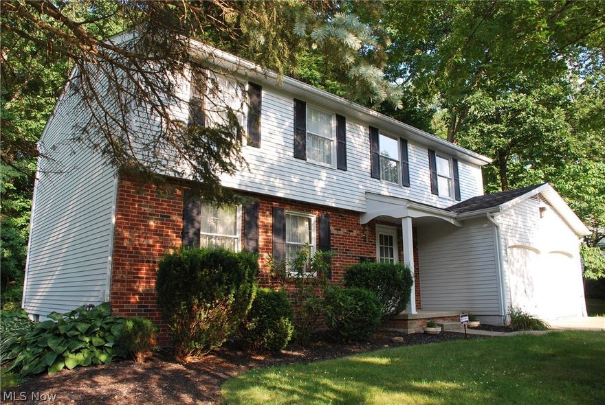 RARE find....5 Bedroom (Yes , I said FIVE bedrooms) and 2.5 bath colonial in the heart of Stow in highly sought after area! Oversized 2 car garage with double doors! Great yard with many mature trees! This is a ONE Owner home, built for their family and now they are ready to have the new family purchase this well built home! Large lush yard with many plants, trees, fish pond and outdoor yard shed. Home has been freshly painted throughout and all carpeting professionally cleaned as well as full roof new in 2015!  Enter into foyer that opens to a huge Living Room that then leads to formal dining room and then to kitchen that has newer electric stove & cooktop with French Door refrigerator and center moveable Island. Cabinetry was updated to oak cabinetry and has an eat-in area. Rear Family Room is also large with a Fireplace and brick hearth, sliding glass doors lead to rear yard. 1st floor is rounded out by a half bath and attached access to oversized garage with 2 doors. 2nd floor has