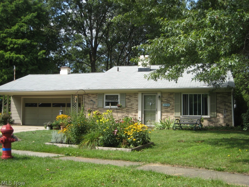 If you are looking for Great Condition - here it is! The seller has meticulously updated this 3BR 1.5 Bath Multi Level home. Walk into spacious living room that opens to the appliances kitchen w/eating area. The 3 bedrooms feature beautiful hardwood floors and new floor to ceiling wood closet doors. The bath is newly remodeled w/vanity, sink, faucets, flooring and shower. Drop ceilings in the living room and kitchen can be removed to open up to original cathedral ceilings. The lower level family room (19x19) is perfect for entertaining and relaxation. Room for a pool table, wall mounted flat screen, exercise equipment or office area. A new half bath too! 2 1/2 car garage. Perennial gardens surround the exterior. List of improvements: Exterior doors & shutters 2013, siding & windows 2005, glass block window 2005, Ohio State Waterproofing w/transferable warranty 2008, sump pump w/battery back up 2008, Breathe Rite Ventilation System 2008, family room and Allure (Laminate) floo