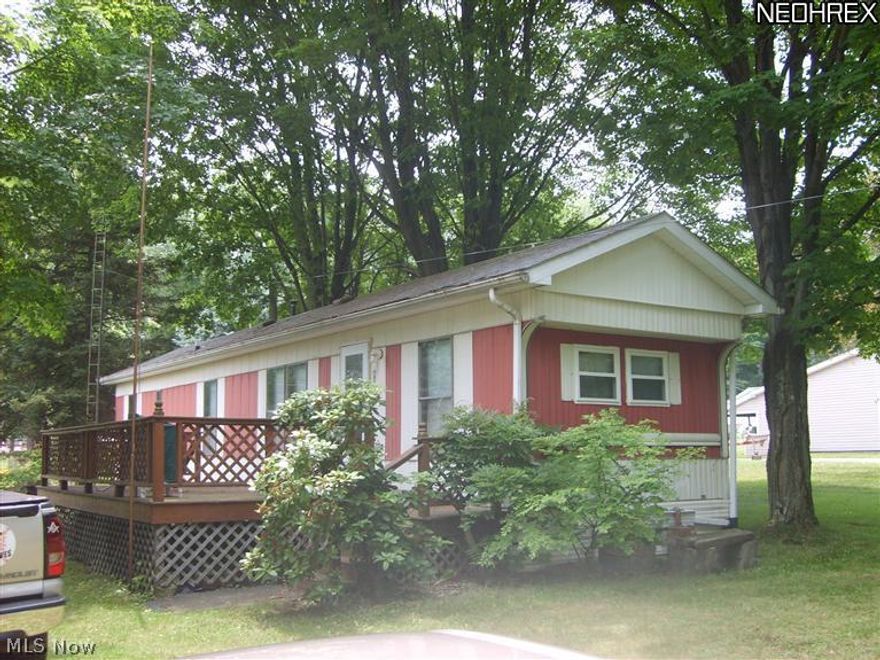 Reduced Reduced ! A Great New Price for a Great Lake Property! Nicely maintained older manufactured home with 2bd/1bath. Can be year round living and not just a seasonal home. Large side deck for evening enjoyment. Outbuilding for extra storage. TOTALLY furnished less personal items. Owners want SOLD!