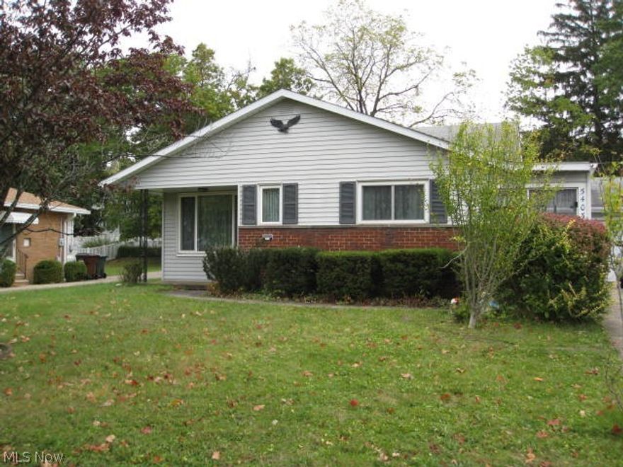 Solid long term family home in need of updating. This three level split features a large living room with dining area off of kitchen. Largest bedroom has double closets. Stanek windows with limited warranty. Glass block windows. Lower level family room with walkout to garage with utility sink. Appliances stay.