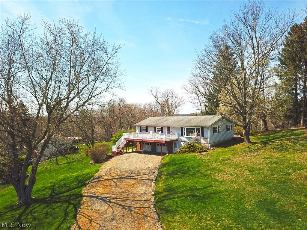Rural Living with an AMAZING & PEACEFUL VIEW in Coshocton City School District! Take time to see this well kept 2-3 bedroom, 1.5 bath home located in Coshocton City School District on a private lane. This home features a newly updated deck, an 2 car attached garage, beautiful patio, and a double deck to overlook the fantastic view. All major appliances--both kitchen & laundry--will convey to the buyers at closing. The lower level is partially finished with family room has a hookup for a woodburning stove, but the chimney has been removed when the new roof was placed. This home will come with a 12 month home warranty provided by the seller. Showings must be with a letter of financial approval and most showing requests notice to be 24-48 hours for seller. Possession will be on or before July 14th, 2022. Contact a licensed real estate agent for a private showing. Do not come on the property without approval of the listing agent.