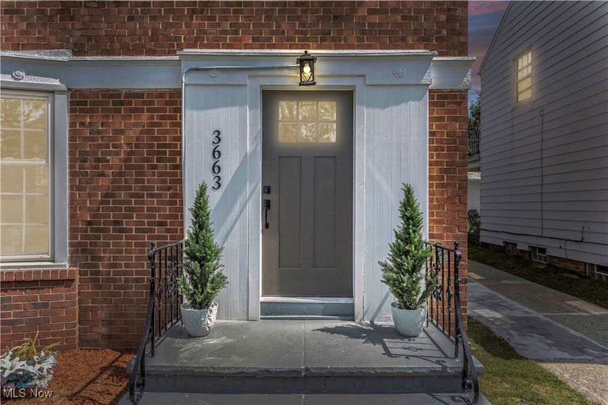 This gorgeous brick colonial is the perfect place to call home! You are welcomed up the front steps into the living room! The living room features beautiful flooring and large windows allowing for tons of natural light! There is a fireplace with mantel as well as built-in shelving that add to the charm of this room! The living room leads into the dining area! This is the perfect space for gathering and entertaining! This area flows through to the gorgeous kitchen! The kitchen features beautiful luxury vinyl plank flooring, granite countertops, white cabinets that wrap around the room and lovely backsplash! Off of the kitchen you will find an enclosed patio that is surrounded by windows! This is the perfect place to unwind at the end of your day! The first floor also offers a convenient half bath! Make your way upstairs where you will find 3 bedrooms and a full bathroom! All 3 bedrooms feature gorgeous flooring, closet space and windows allowing for natural light to flow through! The large, full bathroom offers a tub/shower combination with beautiful tile! There is a balcony overlooking the backyard as well! Continue upstairs where you will find an incredibly spacious 4th bedroom! This bedroom features vaulted ceilings, overhead lighting, luxury vinyl plank flooring and a convenient full bathroom! The full bathroom offers a standing shower and vanity! The fully finished basement is the perfect space for a Rec room, playroom or additional living space! There is a separate laundry area and tons of storage! Outside you will find a detached 2-car garage! With easy highway access, this is near food, shopping and public amenities! This won't last long! Schedule a showing to see it for yourself!