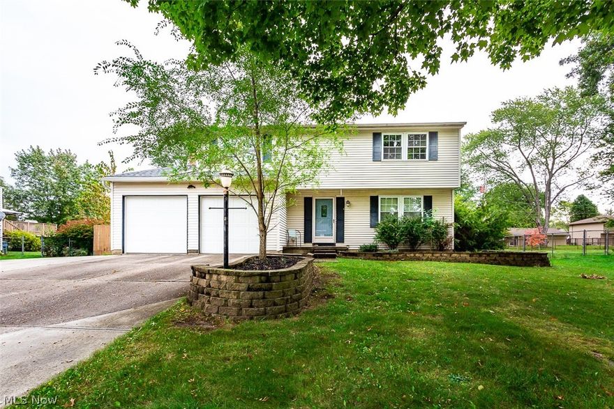 Lovely Strongsville 4 bedroom Colonial w/ finished basement on a large lot w/ 2-car garage.  Quiet street in an excellent convenient location.  The open floor plan and modern layout make this home perfect for entertaining and functionality.  Huge kitchen w/ laminate floors, breakfast bar, center island w/ gas range and ceramic backsplash.  Next to the kitchen is a dining room and a family room w/ fireplace & hearth stove.  Upstairs you will find 4 bedrooms and a full bath w/ jacuzzi tub.  From the family room sliding door, you will be on the large 2-tier deck that has been newly stained and the spacious fenced yard with shed.  New roof & gutters 2020, brand new dishwasher, new garbage disposal, some new carpeting and paint, updated electric panel.  Garage floor has nature stone and the driveway has a concrete extension for additional parking or boat/RV.  All appliances stay.  Plenty of storage in this home.  1-year home warranty is included for added peace of mind.  Excellent location.