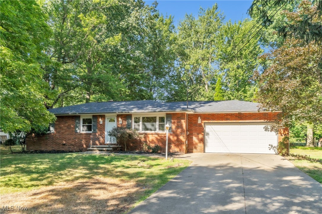 Welcome to 228 Dunbar Road in Tallmadge, Ohio — the perfect combination of location, updates, and space. This move-in ready home sits on over half an acre in a prime location, next to Maca Park and just minutes from local shopping and dining. Inside, you'll find a completely refreshed interior featuring brand-new kitchen appliances, updated bathrooms, fresh paint throughout, and a fully finished basement with new flooring — ideal for a family room, home office, extra guest space as well as a beautiful sun room! Major system upgrades offer peace of mind, including a new roof, new water heater, updated electrical, and a new sump pump. The home also features a professionally installed French drain system with a 10-year transferable warranty from Basement Doctor. Whether you're looking for extra space, low-maintenance living, or a home that’s already been updated top to bottom, this one checks all the boxes. Don’t miss the chance to own a truly turnkey home in one of Tallmadge’s most desirable areas