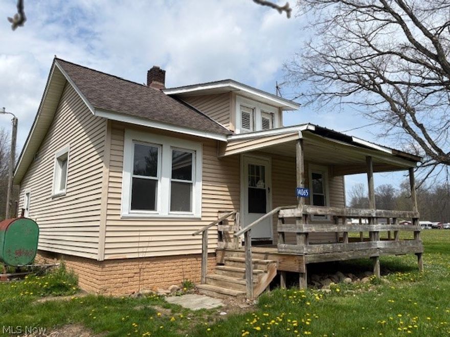 Vinyl sided Bungalow with open front porch. Kitchen with eating area overlooking the front yard. 2.38-acre lot with shed. Seller will not complete any repairs to the subject property, either lender required, or buyer requested.  The property is sold in AS-IS. condition.  Buyer to verify all information.  Buyer or Buyer's Agent responsible to check with Building, Zoning, EPA, DEA, Tax Department or any other requirement for intended use.  Buyer to pay for all inspections.  Subject to clear title.