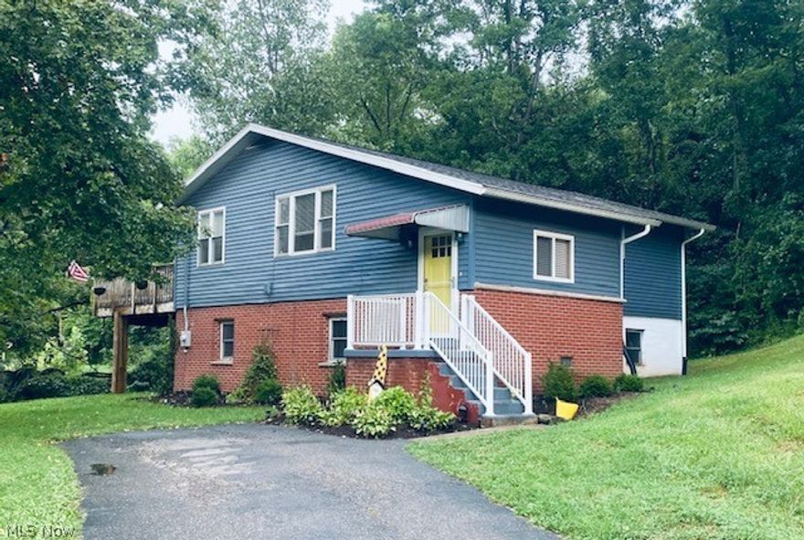 Live the easy life right here in Marietta OH!  This 3 bedroom, 2 bath home is conveniently located only minutes from downtown.  Features of this home include an eat-in dining room area adjacent to the kitchen, with a connecting deck that is perfect for entertaining or simply enjoying some peace and quiet.  This home also includes an partially finished basement, where the third bedroom and laundry room are located.  A paved driveway that leads to a two-car detached garage is another great addition!  This home won't last long, so call to schedule your showing today!