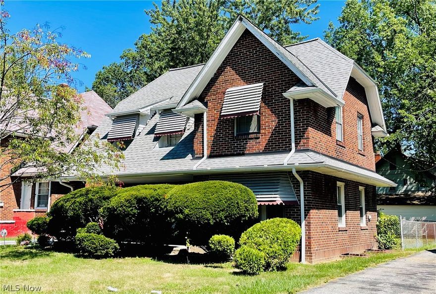SOLID BRICK FAMILY HOME! Disability friendly with an outdoor ramp and inside stair/chair lift. Warm and inviting, this home has been occupied and HOME for generations. Almost the season to get cozy and relax by the Living Room fireplace! Three bedrooms share a large relaxing main bathroom ready for servicing a new generation! The lower level is ready to be completed and already has a powder room. The single detached garage leaves plenty of room for large fenced in family entertaining. Mature, manicured evergreens create privacy for a cozy front porch welcoming New Owners, family and visiting friends. Just in case we are caught in another winter lock-down, this home is a great place to hunker down safely and comfortably! Conveniently located! Cleveland Clinic, CWRU, University Circle, shopping, Medical offices an easy drive to Downtown CLE and MORE are all close! This home is price "as is" under $100K Nearby homes listed considerably higher! ...Priced to sell!!!! Lower taxes make for a