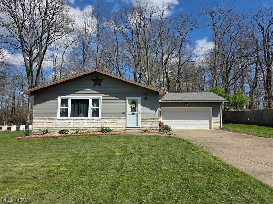 Tucked away on a quiet dead-end street, this delightful 3-bedroom, 2-bath ranch home offers comfort, convenience, and plenty of charm. With cute curb appeal and a wooded backdrop, it’s the perfect blend of cozy living and peaceful surroundings.  Inside, you’ll find a nice-sized living room and a welcoming eat-in kitchen — great for everyday meals and gatherings. Step out back to enjoy the scenery and fresh air from the back porch.  Recent updates include newer windows (approx. 2 years old) and an upgraded 200-amp electric service, giving you modern efficiency and peace of mind. The 2-car garage adds extra convenience with parking and storage space.  Whether you’re just starting out, downsizing, or looking for single-floor living in a quiet setting, this home has so much to offer.  Schedule your private tour today and see the charm for yourself!