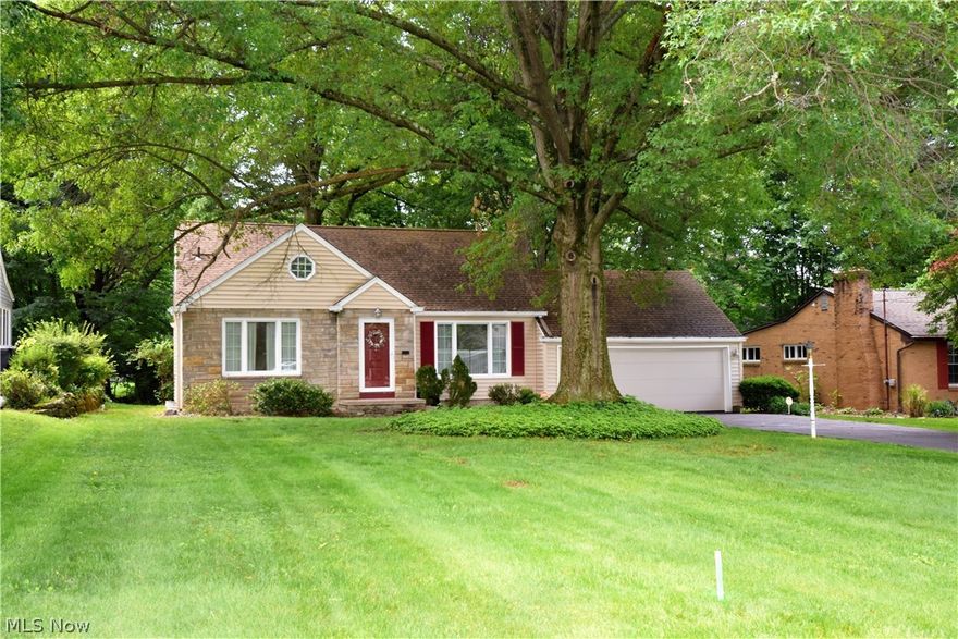 You won't find many homes with such a beautiful setting.  This 3-4 bedroom, 1 1/2 bath cape cod sits on a .39 acres. The first things you will notice are the warm hardwood floors and the spacious rooms.  With 2 first floor bedrooms you can basically have one floor living if you choose.  The large 2 1/2 car garage offers plenty of space for parking and lawn equipment.  The basement is a blank canvas, use your imagination!  With a little bit of updating you can turn this cozy house into your home!