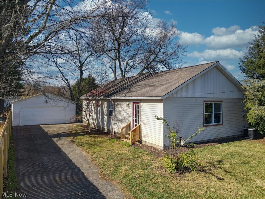 Welcome home to 8709 Hickock Ave SE Waynesburg Ohio! This 2 bedroom 1 bathroom Ranch provides complete one-level, open concept living. Upon entering the front door, you will find every inch of the home has been renovated with new flooring, appliances, fixtures, and has been freshly painted. Step up into the kitchen and notice the amount of storage space and cabinetry! Look out upon the rest of the living areas and imagine the many possibilities to arrange each space according to your family’s desires. Whether you need a larger dining area to host extended family, an area for a home office, or a designated space for your child’s play area, this home has it! Make your way down the hall and find 2 bedrooms, 1 full bathroom, and a mud room/laundry room. Outside features a partially fenced in flat yard space with a detached 2 car garage, as well as a shed. Continue to enjoy the outdoors and other activities as this home is located close to Sandy Creek, Sandy Valley Trail, Lake Mohawk and so