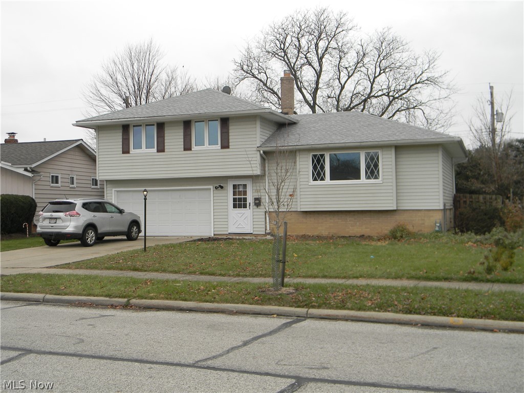 All Updated 3 Bedroom Split Level, With Finished Rec Room with New Carpeting, Updated Kitchen with New Refrigerator, Range , Microwave , Dishwasher,
Disposal, New Kitchen Cabinets and Granite Countertop, and Ceramic Floor, Large Living Room with Laminate Floor, and a Formal Dining Room , with Slider to
Covered Deck, Newly Painted 3 Bedroom with New Carpeting , New Full Bath with Vanity, and Ceramic all Around , Half Bath on the 1st Floor, Foyer Entrance
Newer Windows , Glass Block in Basement , Newer Roof, 2 Car Attached Garage Walk out to Patio and Shed , all in a Fenced In Lot , Walk To Shopping