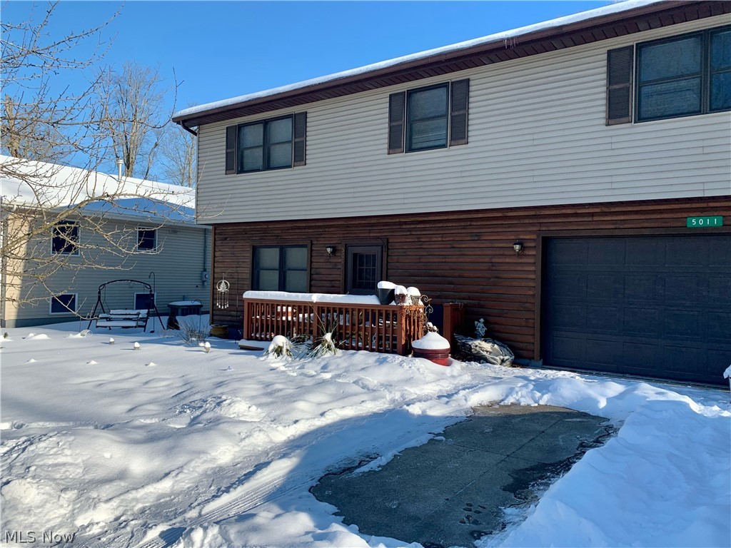 Within walking distance to the lake, beach, lodge, playground, boat dock and more! Attached 2 car garage. First floor: main living area, open kitchen with ceramic floors, half bath, and laundry room. Vast stairwell leads to the second floor: 4 large bedrooms with ample closet space, a full master bath with a second full bath off the main hallway. Sits on 2 lots, .5 acres with wooded scenery, shed, beautiful landscaping with fire pit area, and raised bed garden. Cinnamon Lake is located in the scenic heart of Ohio Amish country. Situated in the Northeastern part of Ashland County just outside of West Salem. Developed in the mid 1970's, over 1200 acres encompass the private development which includes over 200 acres of common areas and a 135 acre lake. Amenities include a 4,500 sq. ft. lodge, a beach & swimming pool, basketball court, tennis courts, sand volleyball & a playground. Wet & dry docks for use are available for a fee to members. Golf carts are allowed. The lake is stocked w/bas