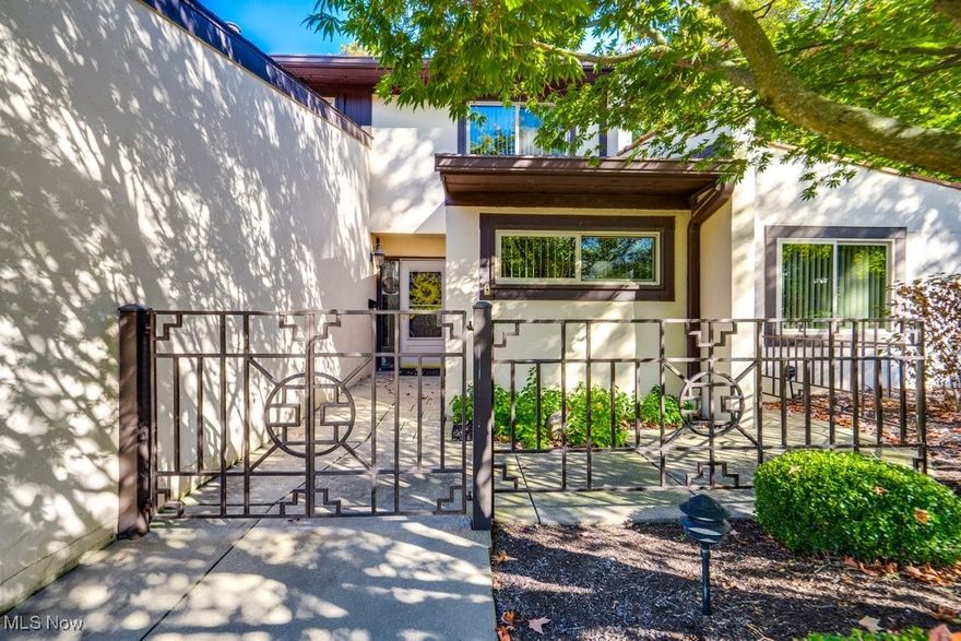 Welcome to this stunning 3,252 sq. ft. Fairlawn condo/townhouse located in the heart of Fairlawn, walking distance to so many amenaties. This one of a kind spacious home at Westwood Village features 3 bedrooms, open iving,dining and family room w/ built ins, a generous sized 4 Season Sun Room w/fireplace, a wall of windows and second entrance, and an office and a flexible bonus room that can serve as storage, hobby space, or more. The inviting floor plan showcases large Pella windows throughout, fans and lights in most rooms. A cooks kitchen with so many cupboards, stainless appliances, luxury vinyl flooring a breakfast bar and an eat in kitchen area with custom built cabinets and sunlit window.  The Master bedroom features a wall gas fireplace and hidden TV built-in feature. The glamour dressing table, the double sink vanity with amazing storage, as well as additional built in drawers, cedar closet, walk-in closet and Bath fitter bath are all featured in the Master Bathroom.  The Laundry room is on the first floor and once again, shelves galore. The Laundry room opens to the two car garage with a brick floor, a built in work bench and a wall of closets for storing just about anything, and even a storage especially for screens.  Location, Location, Location.  Nestled in the heart of Fairlawn, Westwood Village features a built in heated pool in a vacation-like setting, Pickle and tennis courts, a club house w/ full kitchen, library, offices, dressing rooms and lockers and showers for Pool lovers. Walking, Biking or short drives to the Mall, library, fine and casual dining, medical facilities, exercise facilities and parks and easy access to highways!   You must check out this great Real Estate Offering at 3404 South Smith Road. Cable and Wi-fi pkg included in Monthly fees.