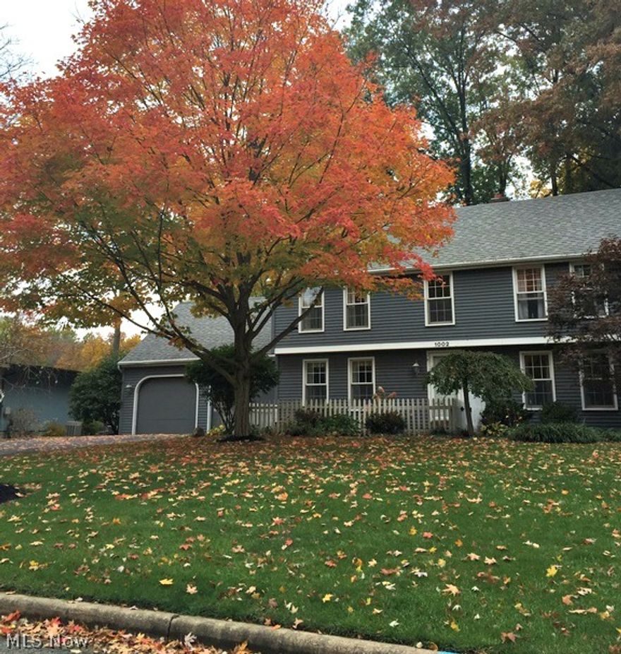 This is a spacious 2,700+ square foot Colonial home with a partially finished basement.  Adjacent to Anderson Run/Mill Creek Park, it has a private wooded back yard.  The front door leads to an open stairway with adjacent formal living and dining rooms.  The combined kitchen & family room is located off the foyer at the rear of the home. A sunroom with a wooded view is off the kitchen/family room.  Updated kitchen includes new stainless steel Whirlpool appliances and white cabinetry open to a breakfast area, family room with a gas & wood burning fireplace and sunroom. A wet bar and updated full bathroom is also within this combined living area.  The formal dining room has refinished hardwood floors and crown molding. The dining room also has built in storage.  The large formal living room has a wood burning brick fireplace and ample sunlight!  The open staircase with refinished steps leads to three oversized bedrooms located on the second floor. The second floor has a linen closet, a w