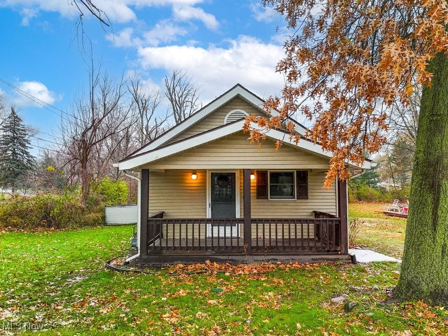 Small house packs a big punch! Are you wanting to kick your landlord to curb and start paying yourself back? This adorable Ranch home in Stow City is the definition of "tiny home" perfection. Situated on a roomy corner lot, this adorable Ranch home features a fully fenced yard and a covered patio perfect for entertaining or simply enjoying the outdoors. The spacious front porch enters the open floor plan featuring a combined living/dining area with low maintenance LVT flooring. The kitchen comes with newer stainless-steel appliances, including a portable dishwasher, ample cabinet space, and concrete counters! Enjoy the ease of a first-floor laundry room with Washer and Dryer included. The full unfinished basement and oversized one-car detached garage provide abundant storage options. Located in a prime Stow City location close to dining, shopping, Hudson, Kent, and Route 8, this home is sure to please. Start your New Year's Resolutions in your New Home! Make an appointment today!