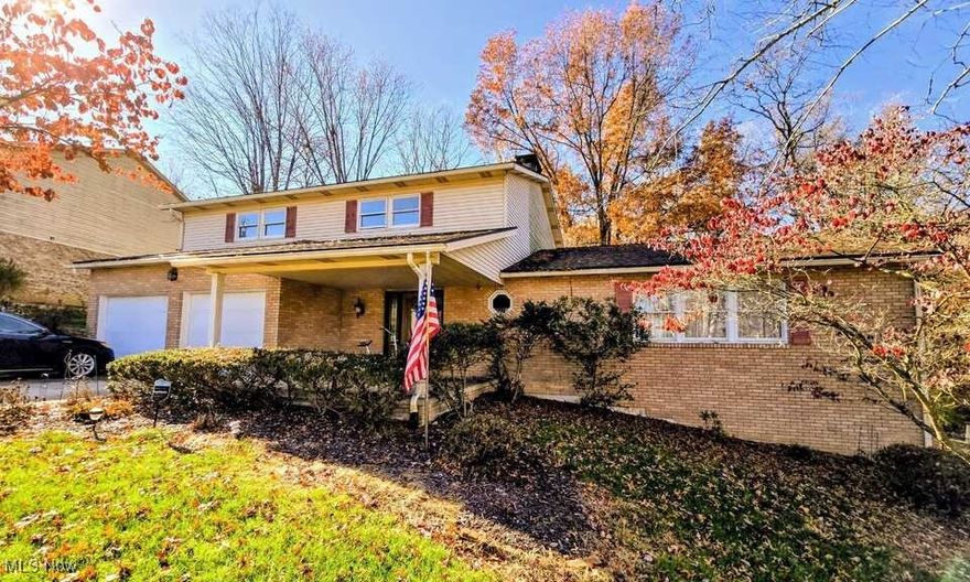Located in one of St. Clairsville’s most prominent subdivisions, this spacious home sits on a quiet cul-de-sac and offers exceptional curb appeal with mature landscaping and a well-maintained exterior. With over 3,000 square feet of finished living space, the home features a massive, fully renovated kitchen, a dual-sided fireplace, and updated living and dining areas designed for comfortable everyday use.
The property includes large bedrooms and updated bathrooms with modern fixtures and finishes. The lower level offers a finished basement with abundant storage and additional living or recreation space.
The backyard has been transformed into a private gathering and entertainment area, perfect for hosting guests. An attached two-car garage and attractive outdoor spaces complete the property.
Conveniently located in the Wellington Woods subdivision within the St. Clairsville-Richland City School District, this home combines size, updates, and location in a sought-after neighborhood setting.