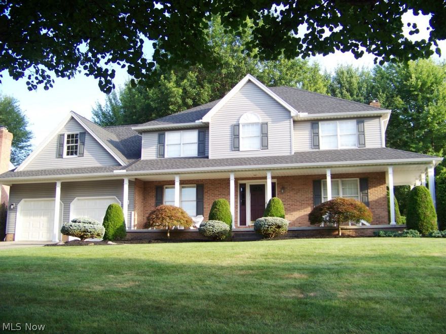 Live like a king on Kings Lane in this stately two story colonial in the heart of Canfield.  The first floor offers an inviting open foyer, an eat-in kitchen with stainless steel appliances and a bay window overlooking  the deck and backyard, recently painted and carpeted family room with a gas fireplace and bay window, dining room with a tray ceiling, living room which is currently being used as an office and one of the largest laundry rooms you will find. In the kitchen are 2 doors to access the private deck which leads to the shaded back yard complete with a Rainbow Play-System, 8x8 storage shed and there is nothing but woods behind you, no other homes. The second floor has a master suite with a walk-in closet and an en suite that has a Jacuzzi tub, separate shower, and a double vanity. 3 additional bedrooms and a full bath complete the floor. The basement has a rec room in half and plenty of additional storage space in the other half. New 40 year shingles in 2012. 75 gal hot water