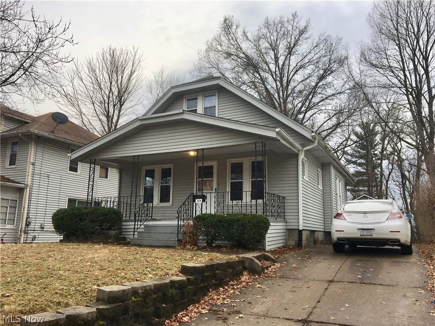 Nice curb appeal offered in this Goodyear Heights Bungalow!!! Loads of potential - 2 bedrooms on the main floor and a large finished attic ideal for a third bedroom or additional storage space!!! Home has a great front porch and looks to have some "bigger ticket" updates!!! Ideal location near schools, shopping, and highway access!!! Realize the value and make this one yours before it's gone - definitely won't last!!!
