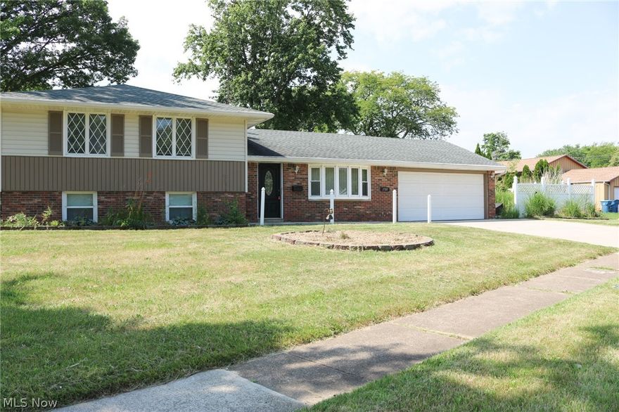 Take a look at this updated and a very meticulous 4 bedroom, 2 full bath home. Gorgeous, refinished hardwood floors throughout the majority of the home.  A nice sized patio. Updated kitchen, updated bathroom, new windows, newer concrete driveway, walkways, patio and garage floor. 2018, tear off roof, newer gutters, and downspouts. 2018, waterproofing with new drain tile and new sewer system along with an outdoor sump pump.  Downstairs fridge/ freezer and front door security pad do not convey. Call today to see this lovely home.