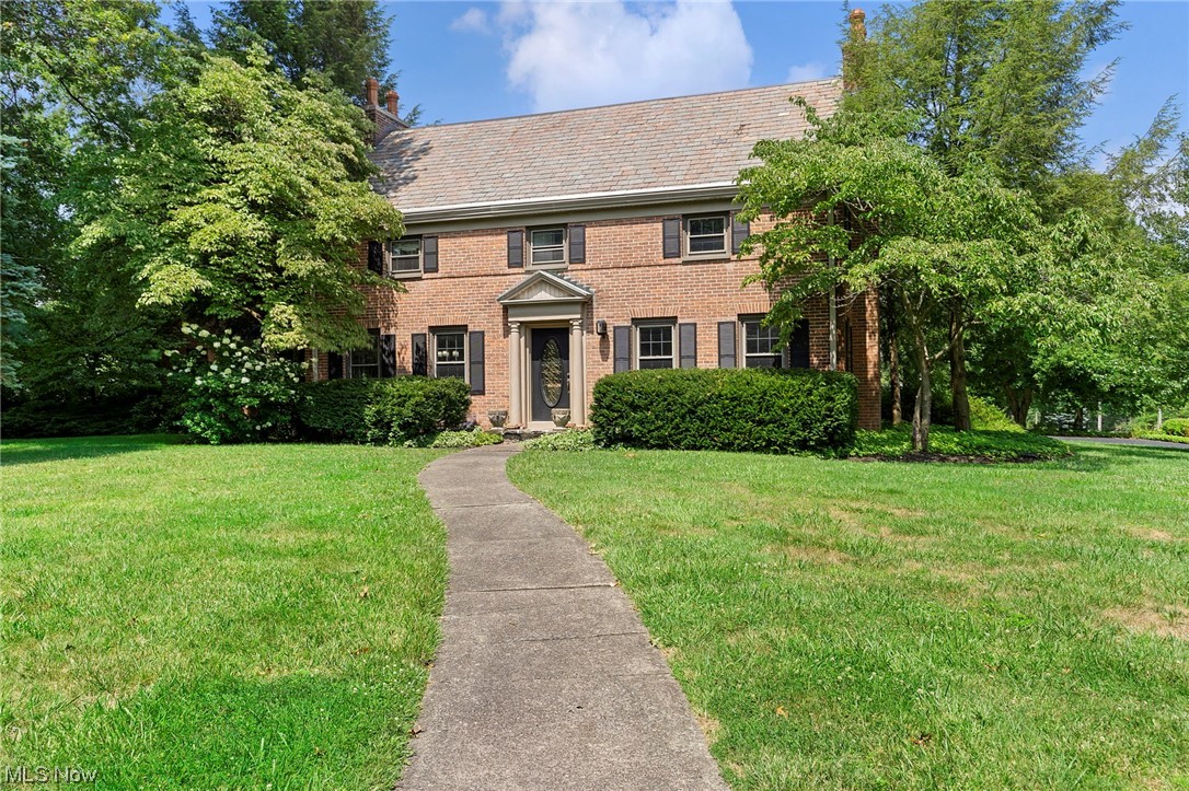 House Back on the Market by No Fault of the Seller or Home! This Spectacular Property is in the Heart of Canfield and you would never know it with this Tree-lined Private Backyard and 6 car garage. There is so much Character in This Stunning Brick Estate! The Owner has taken great pride in updating the wonderful living spaces while maintaining the integrity and historic charm of this home. The roof is slate and tiles have been restored as needed. The Brick from the house was made in Marietta. As you enter the dwelling, the side porch is so cozy. Inside the foyer it is so bright and airy. The Kitchen was all updated in 2020 with new quartz countertops and new appliances with a convection cooktop that heats up in seconds. The hardwood floors are preserved throughout the home. The Great room takes your breath away and there is still a large living room and dining room to entertain in. The Bedrooms are all upstairs and the Primary Bath was remodeled in 2020 with heated shower, heated floors and LED mirrors. The Furnace and AC was updated in 2018 and has zone and climate control. Complete updated paint throughout. There is an awesome workout room on a unique tile floor in the lower level. So much to​​‌​​​​‌​‌​​​‌‌​​​‌‌‌​​‌​​‌‌​​​​ Enjoy!!