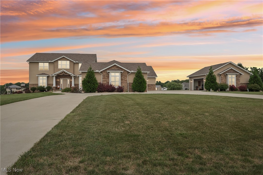 Welcome to this exceptional 7-bedroom, 5.5-bathroom estate, ideally located in the highly sought-after Highland School District. Thoughtfully designed for multi-generational living, this spacious home offers the perfect blend of luxury, comfort, and functionality.
The main home features a chef’s dream kitchen with elegant cherry cabinetry, a large center island, double ovens, and a gorgeous butler’s prep area—perfect for entertaining. Enjoy convenient first-floor living with a spacious primary suite and a large main-level laundry room. Upstairs, you'll find a versatile loft space and four generously sized bedrooms, including a private "mini-master" suite with its own full bath.
The in-law suite is truly a home of its own, designed for one-level living at its finest. This wing offers two additional bedrooms, including a second primary suite, two full bathrooms, a full kitchen, living room, and a private laundry area—ideal for extended family or guests.
Each section of the home has its own private staircase leading to the expansive basement, offering abundant storage and a rough-in for an additional half bath.
Car enthusiasts and large households will love the attached 4-car garage plus a detached 2-car garage—ample room for vehicles, hobbies, or equipment.
This one-of-a-kind property offers endless possibilities and is a rare find in this prestigious district. Don’t miss your chance—schedule your private tour today!