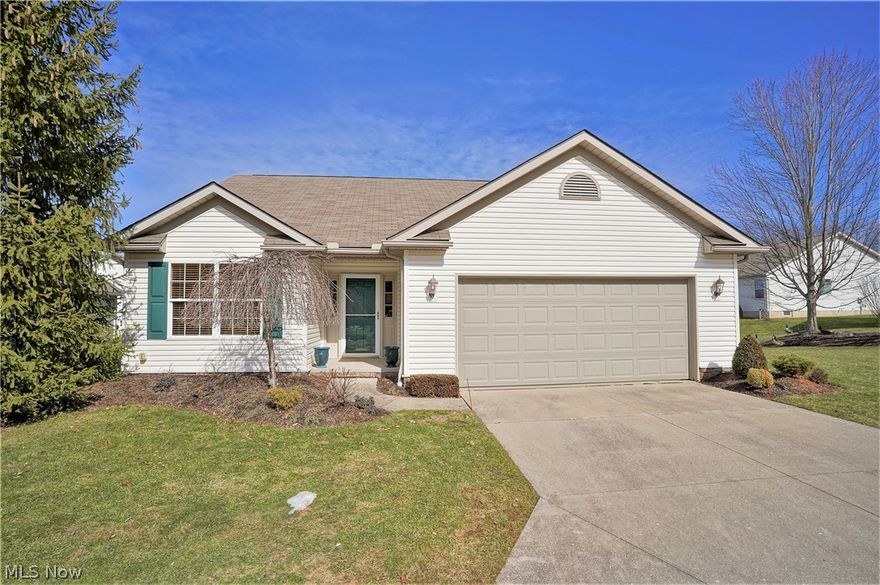 Wonderfully maintained home shows like a model. Beautifully decorated in neutral tones throughout. Upon entering the spacious foyer, you will see the open floor plan that boasts vaulted ceilings in the great room, kitchen, dining room and sunroom. The front bedroom offers natural sunlight through the windows. There is another bedroom on the opposite side of the foyer that is currently being used as an office. The guest bath is located near the front bedroom. Off the foyer is the first-floor laundry room complete with utility tub, washer and dryer. Once in the vaulted great room you will notice the beautiful fireplace wrapped with white trim and mantel. Windows (with plantation shutters) on both sides of the fireplace allows a nice view of the pond off the backyard. The vaulted ceiling in the kitchen adds to the feeling of openness while looking to the great room and dining area. Located off the dining room is the vaulted sunroom that is encased by lots of windows bringing the natural b