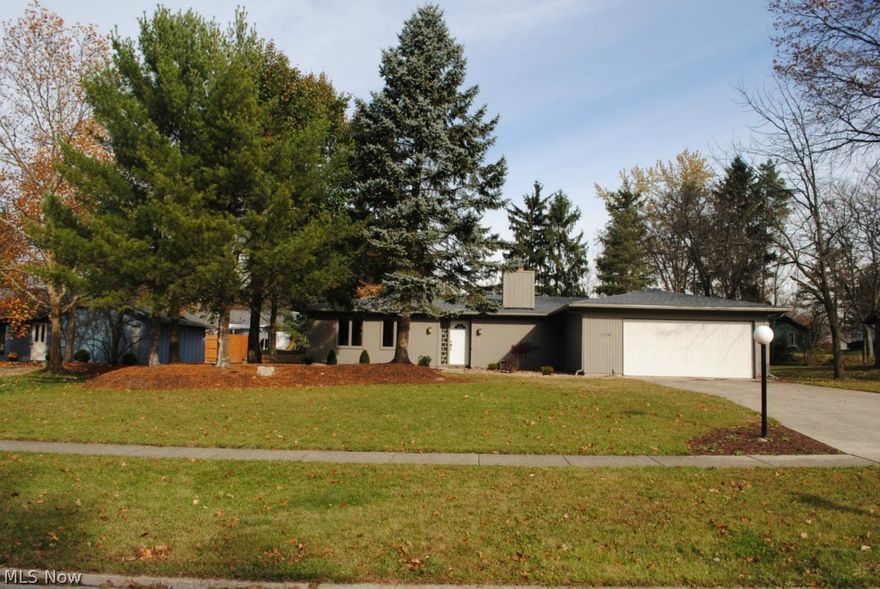 Pristine Upscale Ranch Loaded With Very Expensive Improvements .... New Kitchen With Rich Maple Cabinets, Granite Countertops And Stainless Appliances .... Newer Roof .... Newer Luxurious Bathrooms .... New Slate Tile .... New Carpeting .... Freshly Painted Interior And Exterior In Warm Earth Tones ....  Open Family Room With Wood Burning Fireplace .... 21x10 Bonus Room Could Be Office, Craft Room Or Other .... Beautiful Wooded Lot And Setting .... Desirable "Forest Park" Complex Near Metro Park .... Neighborhood Club House And Swimming Pool .... Very Special ....