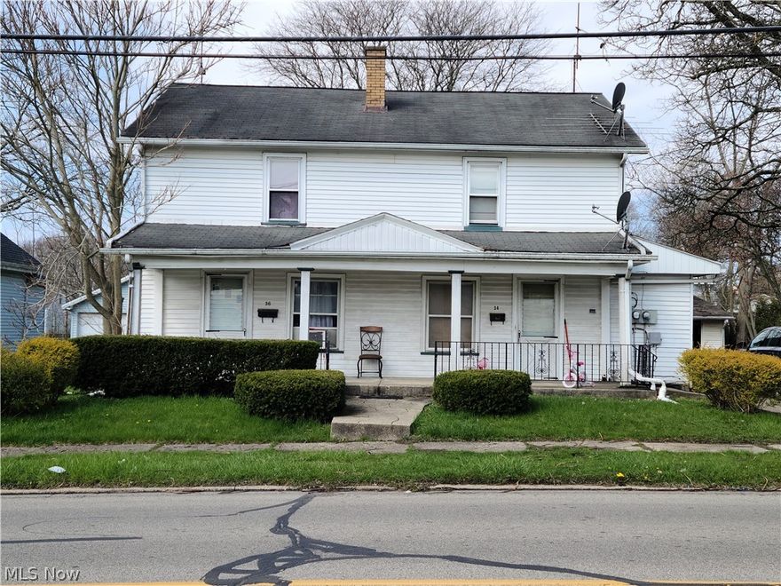 So much potential in this 2 story duplex.  Separate private basements, covered front and back porches.  One unit is a 2 bedroom, 1 and a half bath.  The other is a one bedroom, 1 bath unit.  Both have laundry facilities in each basement.  Sold AS IS