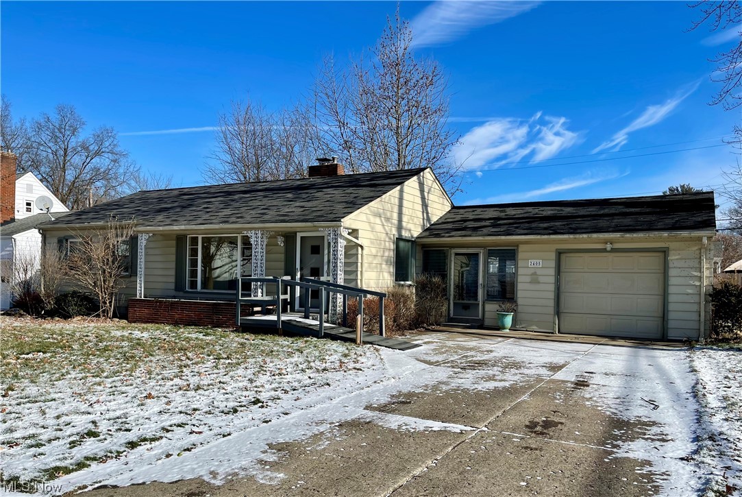 Looking for a ranch home with first floor laundry in Cuyahoga Falls? You just found it! This ranch home features an attached garage with entry to an enclosed patio/breezeway. The breezeway leads directly into the totally remodeled kitchen with all appliances. There is a small bedroom directly off the kitchen that could also be used as a home office. The spacious living room with a wood burning fireplace also offers an area for a dining room table. There are two other bedrooms and a full updated bathroom with laundry hookup. The waterproofed basement is partially finished for a rec-room or possibly another bedroom and living space and the lower level also includes a full bathroom and an additional laundry room and lots of storage space. With hardwood floors and fresh paint throughout, you aren't going to want to miss this one! Call your favorite Realtor to schedule your showing today!