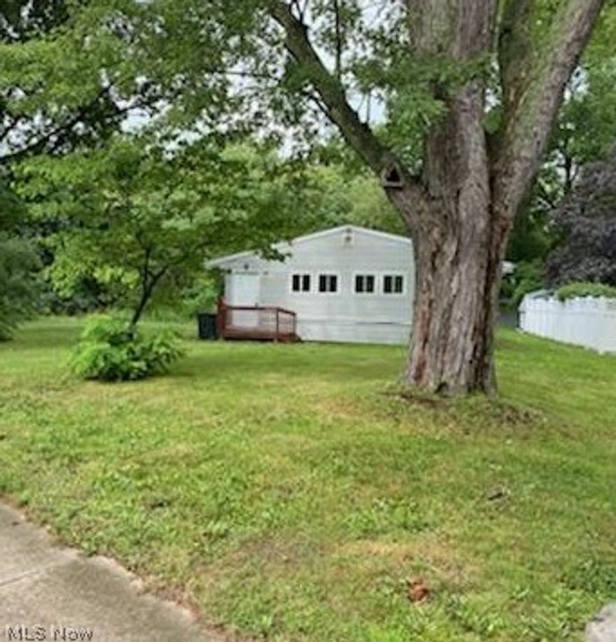 So many updates for this ranch on over an acre. The updated kitchen offers a large pantry, and stainless steel appliances. A master suite was added in 2005, and offers a bedroom, full bathroom, and access to a first floor laundry room. The enclosed front porch adds extra living space, year round. The basement was waterproofed in 2006, hot water tank is less than 2 years old, newer flooring in living room and hallways. Freshly painted interior. There is a 2 car garage that can be accessed from Jason Ave. Seller will do no repairs, selling AS IS.