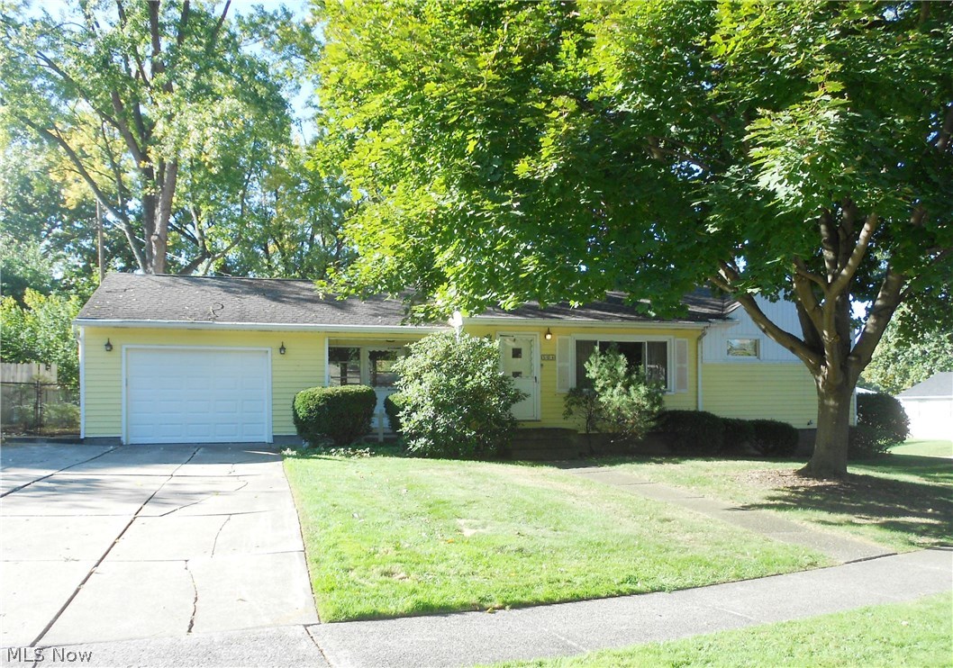 Spacious and well maintained 2 bedroom, 2 full bath ranch. Beautiful hardwood floors in dining room and bedrooms, plus hardwood under living room carpeting. Many newer windows, partially finished basement with full bath and separate room perfect for office or exercise room. Enjoy the fall relaxing on the breezeway. Backyard is fenced, oversized 1 car garage is great for storing yard equipment.