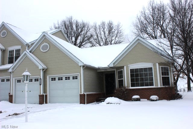 Almost like new! An absolute move in 2 bedroom, 2.5 bath ranch condo with approx. 1654SF plus a full unfinished basement* New carpet through out and freshly painted (2/2015)* Foyer entry with ceramic floor opens to vaulted great room with 2 skylights, gas log fireplace, fan & slider to patio* Den with fan* Eat in kitchen with ceramic floor, chair rail, fan & fully applianced (refrigerator, range, dishwasher, disposal and microwave)* Vaulted dining* Vaulted master bedroom with walk in closet & master bath with double vanity* Guest bedroom & bath* 1st floor laundry with closet* 2 car attached garage* Full 12 course basement with glass block windows and 1/2 bath* Hot water heater 11/2014* Convenient location in Green* A must see!