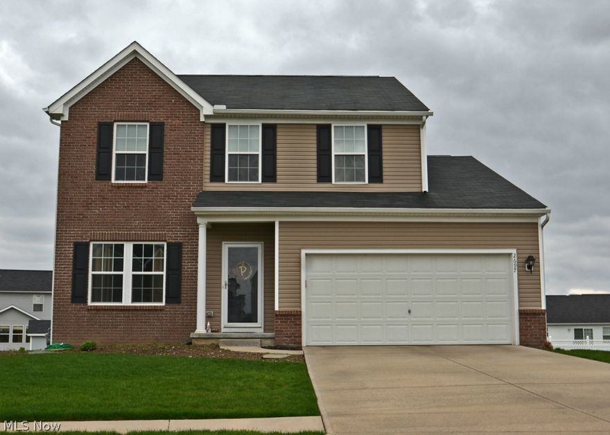 This lovely 4 bedroom home is ready to make yours!  It is in excellent condition in quiet Plain Township Diamond Park subdivision.  This home has a beautiful deck ready for the summer months accessible thru the comfortable, well-lit morning room which is adjacent to the open and clean kitchen.  Both the morning room and kitchen are part of an open floor plan beside the large family room and fireplace.  Additionally on the main floor is an entry way living room and a laundry room.  The basement is roughed in to be easily finished to your liking, including another bathroom!  The second floor of the house has 4 bedrooms including a very large master with it's own bath.  This great home has a lot to offer!