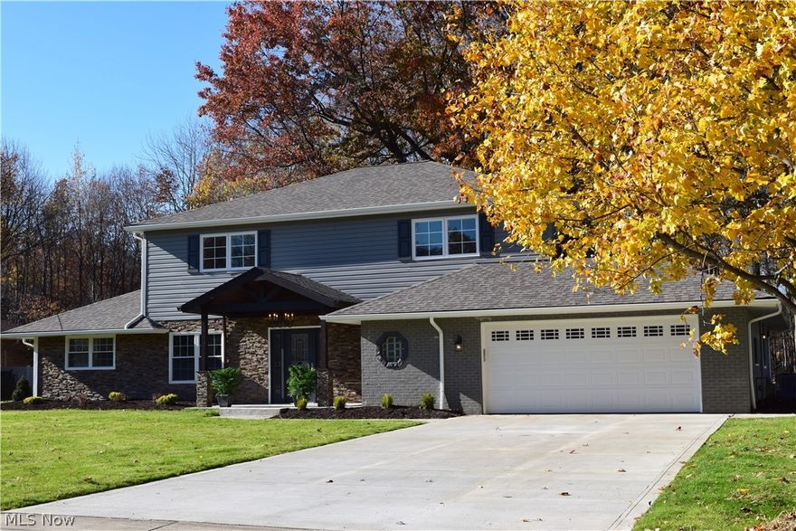 This spacious 5 bedroom, 3 full, 2 half bathroom Westlake colonial has been completely renovated.  Open floor plan with gleaming oak hardwood throughout first floor. Gourmet, eat-in kitchen with granite counter-tops, large center island, stainless steel appliances, double ovens, gas range with oven, storage and counter space galore.  The formal living room and great room have fireplaces.  There is a first floor master/guest bedroom with en suite.  Large dining room, office,  and ½ bathroom complete the main floor.  Relax and enjoy a beverage on your vaulted ceiling back patio with ceiling fan.  The second floor has two more bedrooms, a guest bathroom, large laundry room and a second master bedroom with en suite and walk-in closet.  This house boasts three full glamour bathrooms with rain shower heads.  The massive, fully finished basement has amenities that include a bar, pool table and ½ bathroom, plus possible media room and wine cellar potential.  Tons of storage space.  Oversize 2