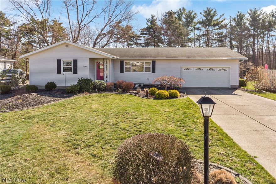 Pretty, spacious & beautifully cared for 3 bedroom/2 bath ranch on cul de sac backing up to Portage Lakes State Park* Living room with large front window* Vaulted great room with 2 skylights, gas log fireplace, slider to patio & view of back yard* Dining room with wood floor & chair rail* Kitchen full applianced with stainless refrig, range microwave & dishwasher (approx. 5 yrs.), wood floor & pantry* Wood floor continues through hall way* Bath with ceramic floor & ceiling fans in bedrooms* Additional 680SF in lower level recreation room with a dry bar & work out or play room* Glass block basement windows* Washer & dryer (approx. 5 yrs.)* Windows, siding & well (approx. 2001)* Hot water heater (approx. 5 yrs.)* Attached garage 20x24 with door opener, service door to back yard, water & storage closet* Fenced back yard with patio* Quiet setting* A must see!